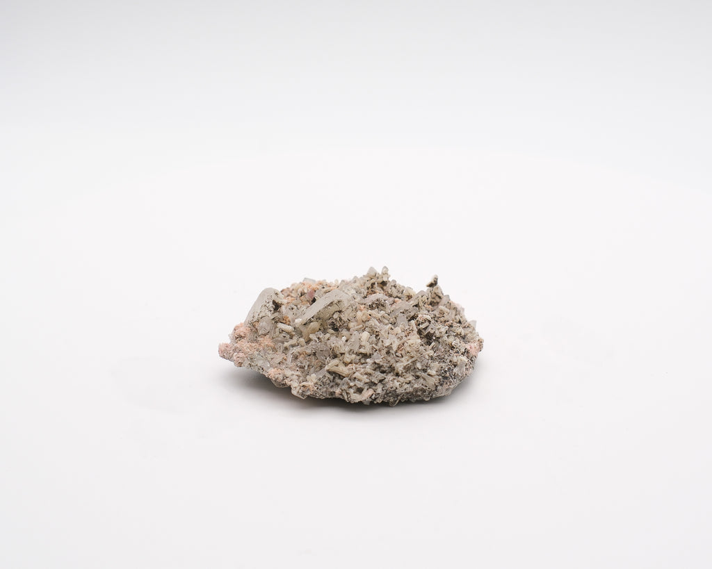 Rhodochrosite sur amas de quartz