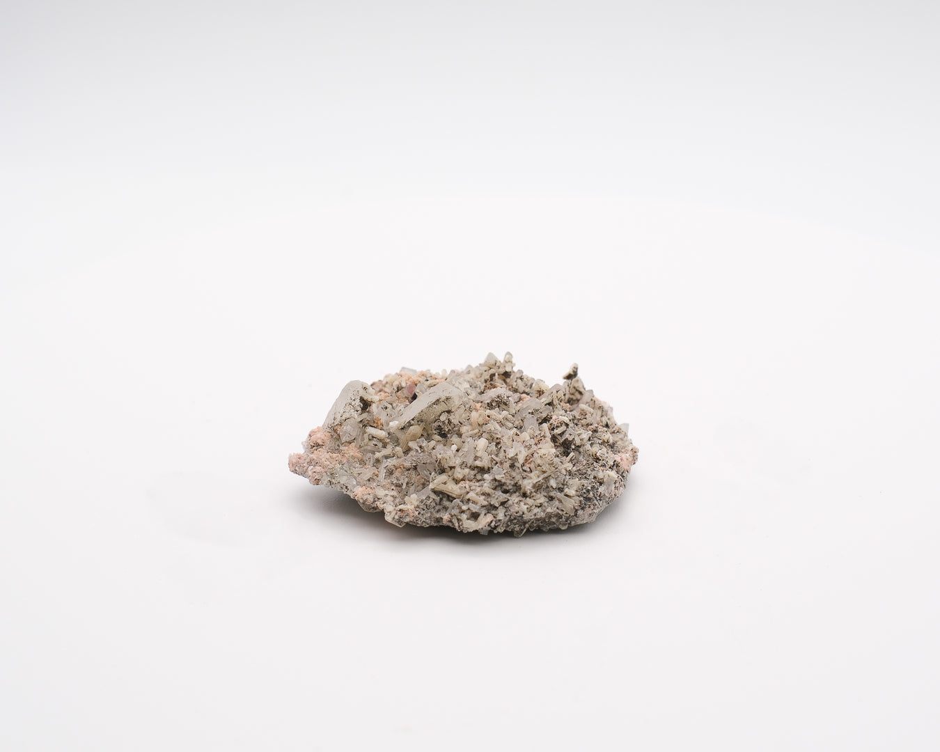 Rhodochrosite sur amas de quartz