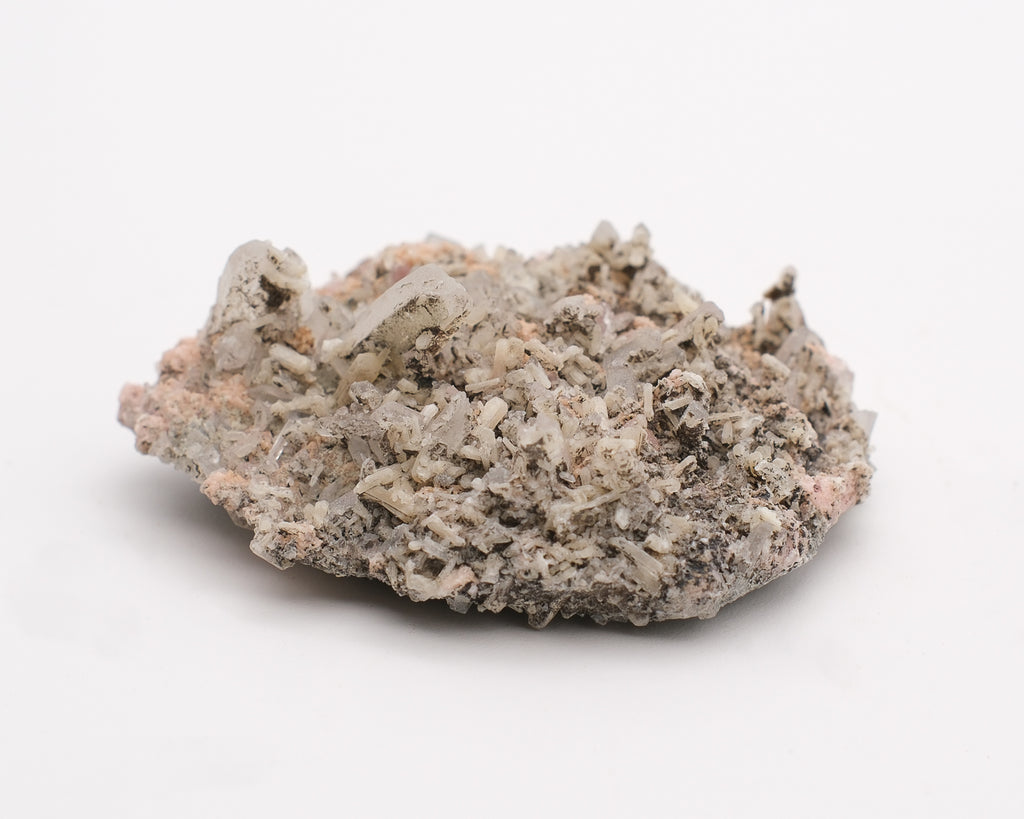 Rhodochrosite sur amas de quartz